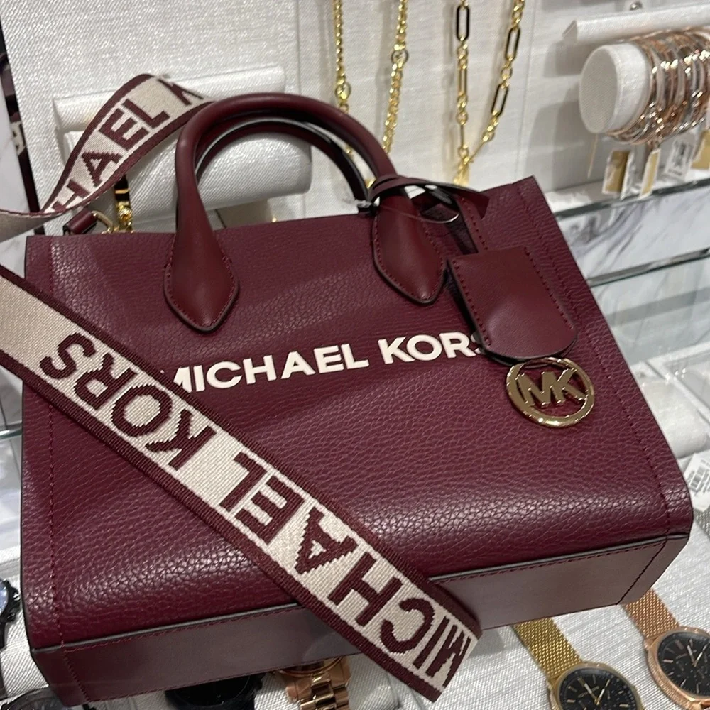 Michael Kors Mirella Small Pebbled Leather Crossbody Bag
Oxblood
NWT - Picture 12 of 16